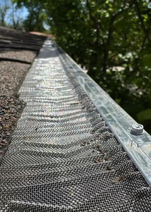 The same gutter clear with micro-mesh guard installed