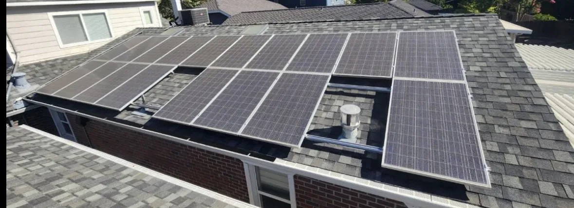 Dust-covered solar panels on a Sacramento roof before cleaning