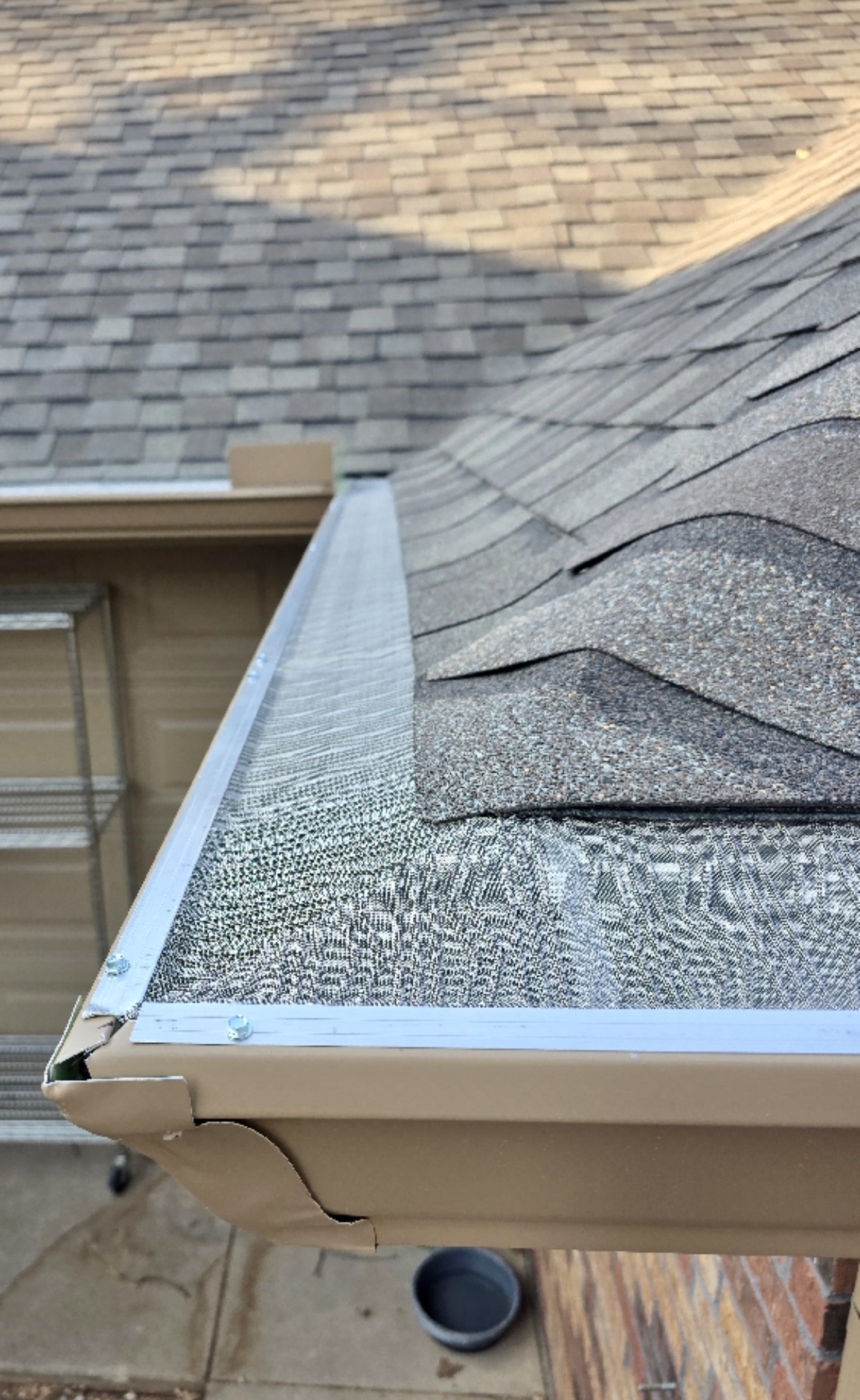Newly installed gutter guards.