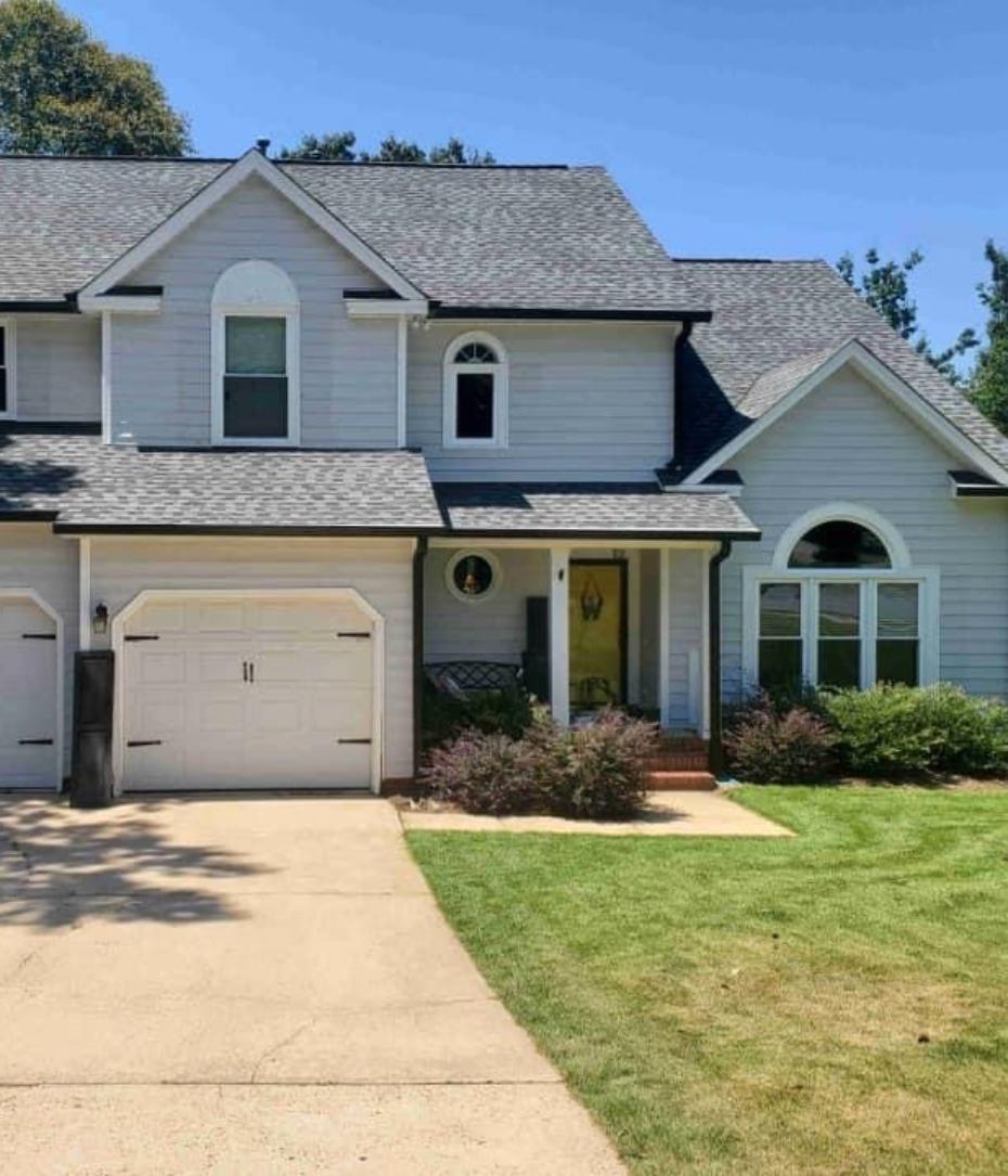 house with newly installed gutters